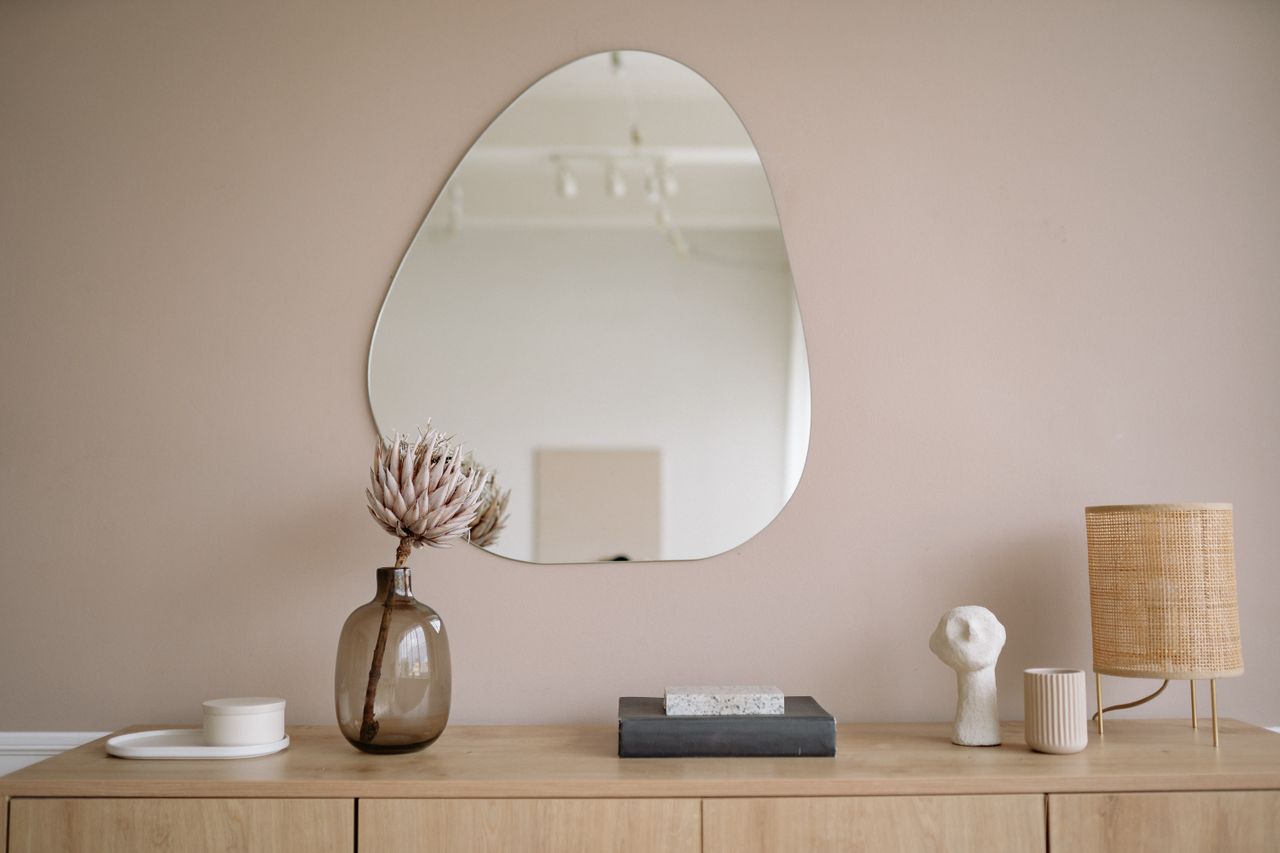 services-img A modern kitchen sink with wooden utensils and a minimalist decor vibe.